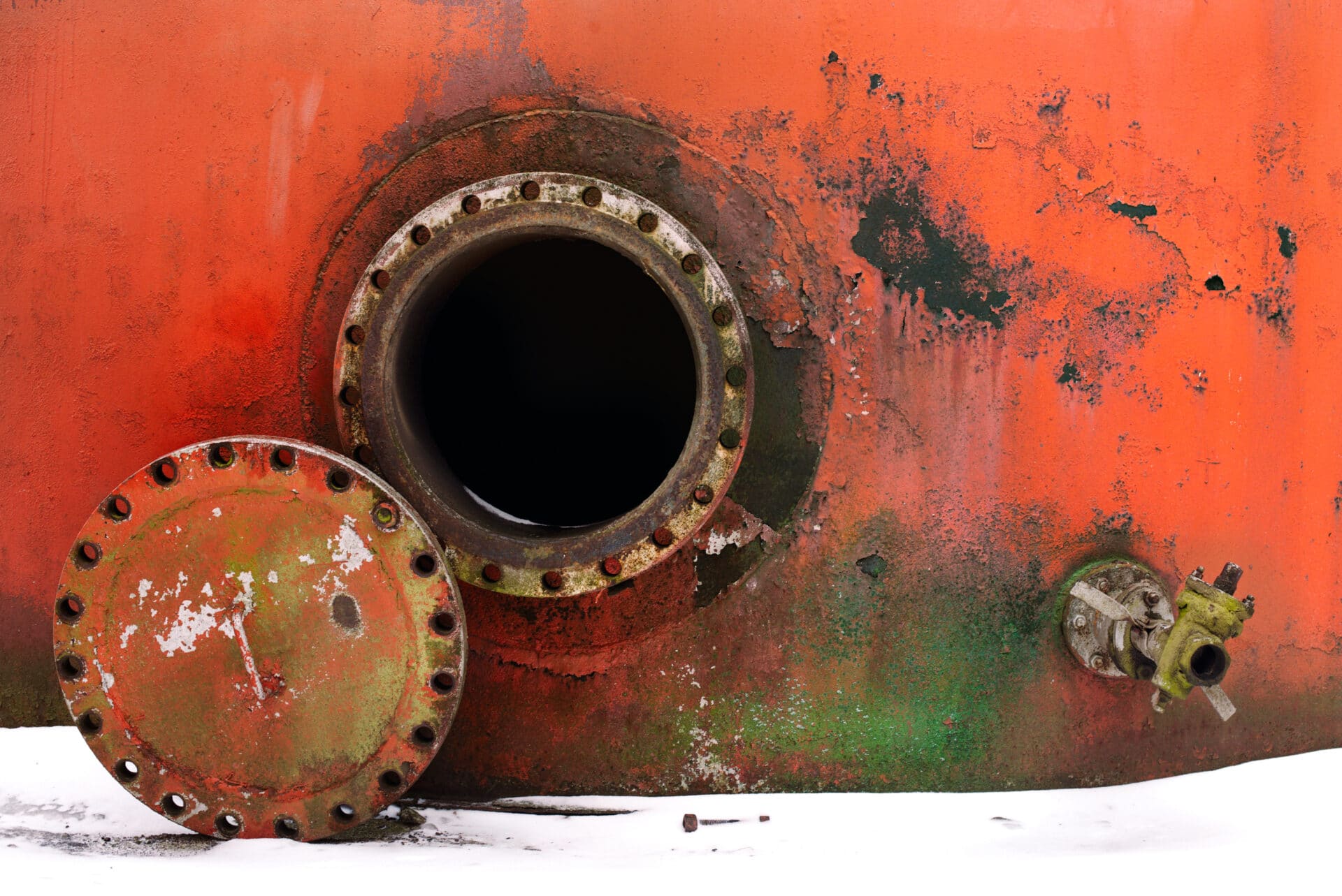 Opened,Rusty,Manhole,On,The,Red,Fuel,Tank